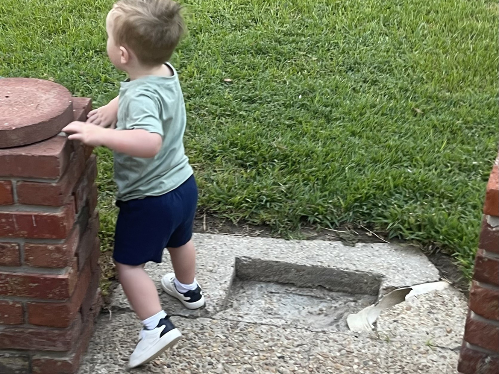 Child Close To Hole