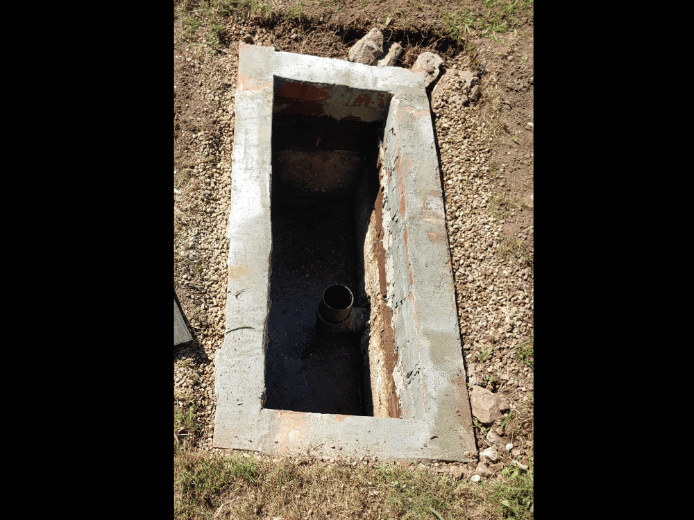 Cement edged water well, open with no cover